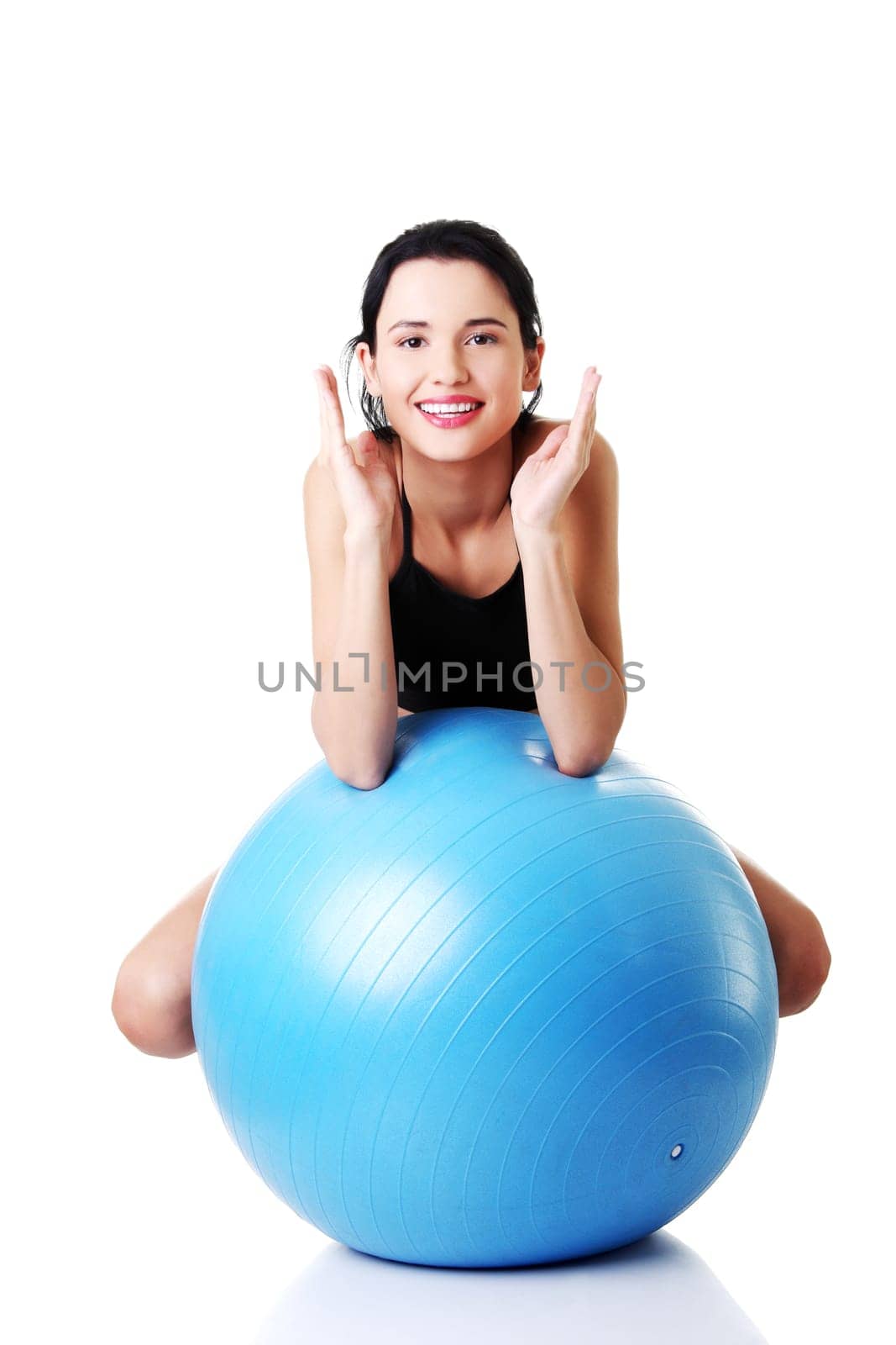 Beautiful young healthy lifestyle woman with pilates exercise ball.