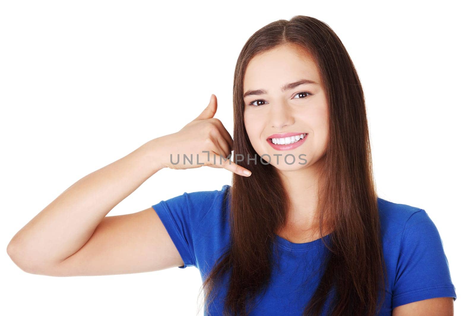 Lovely teen woman gesturing "call me"" , isolated on white"