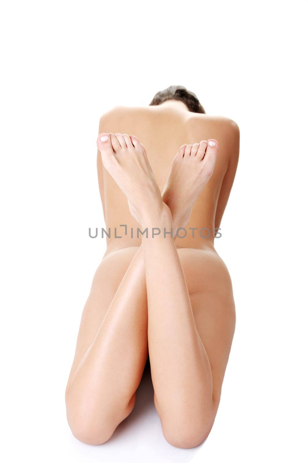 Beautiful nude fit woman body, isolated on white