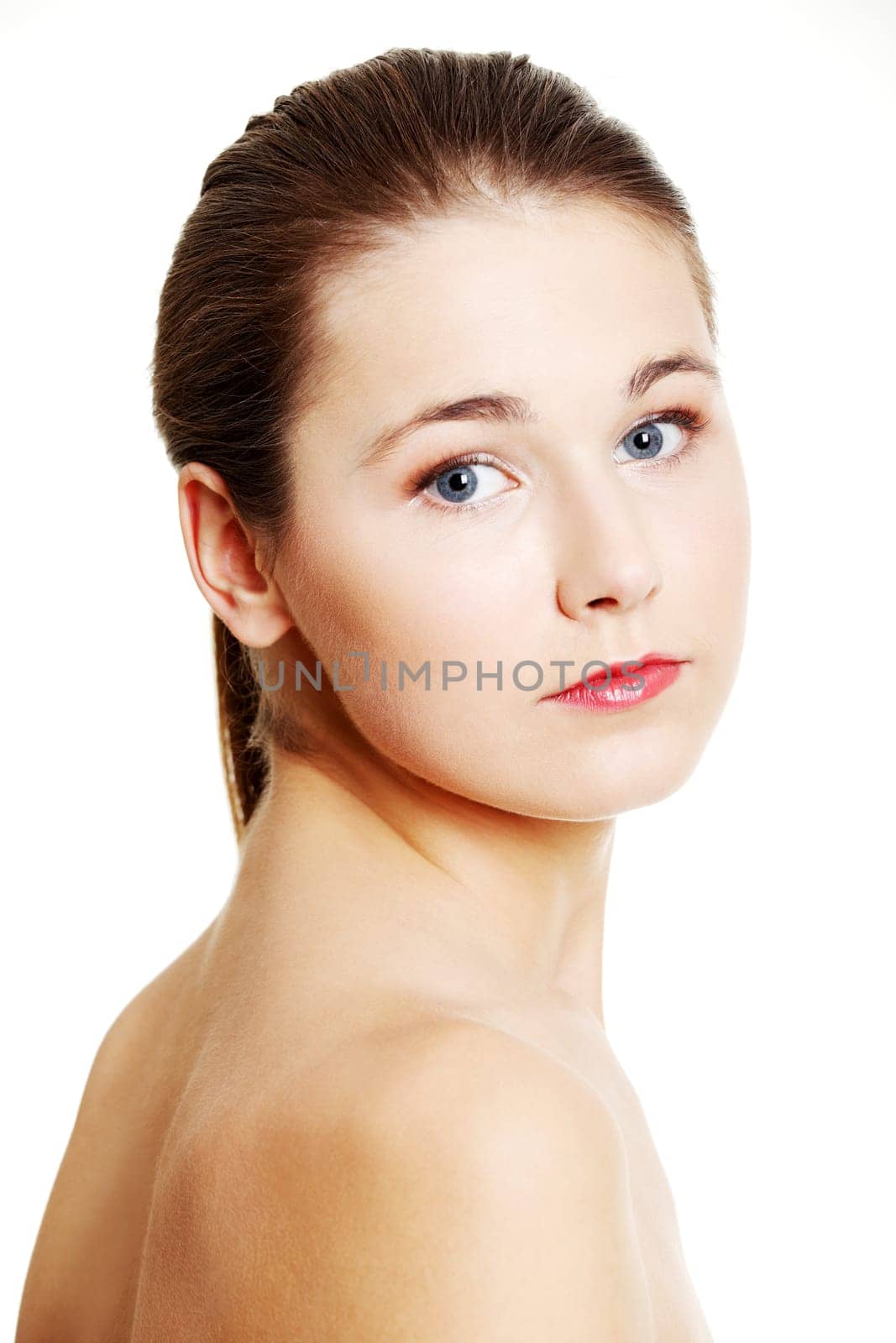 Portrait of a beautiful female model on white background