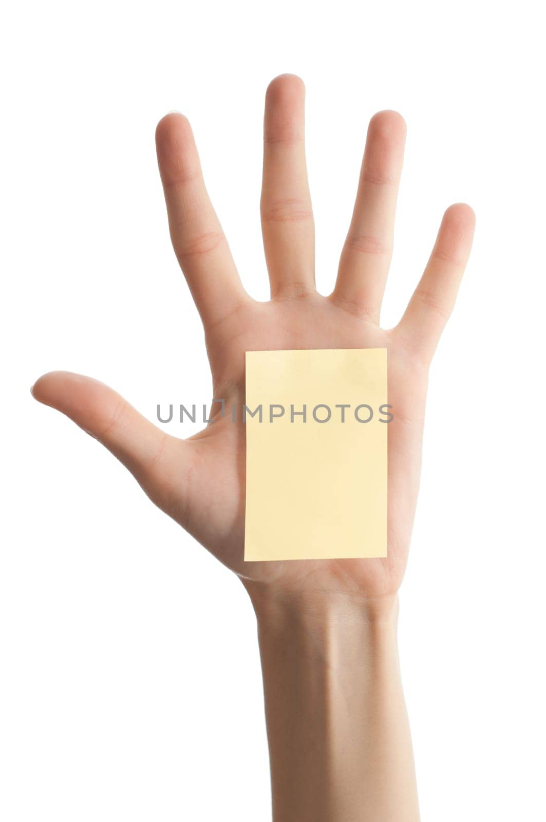 female hand with sticky office note isolated on white background . Note is blank and yellow