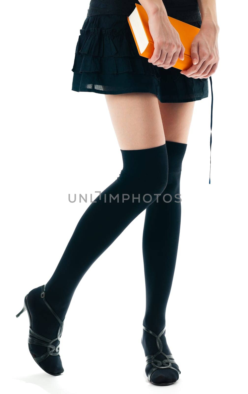 view of the lower body part isolated on white background of woman wearing skirt, stockings and high heels