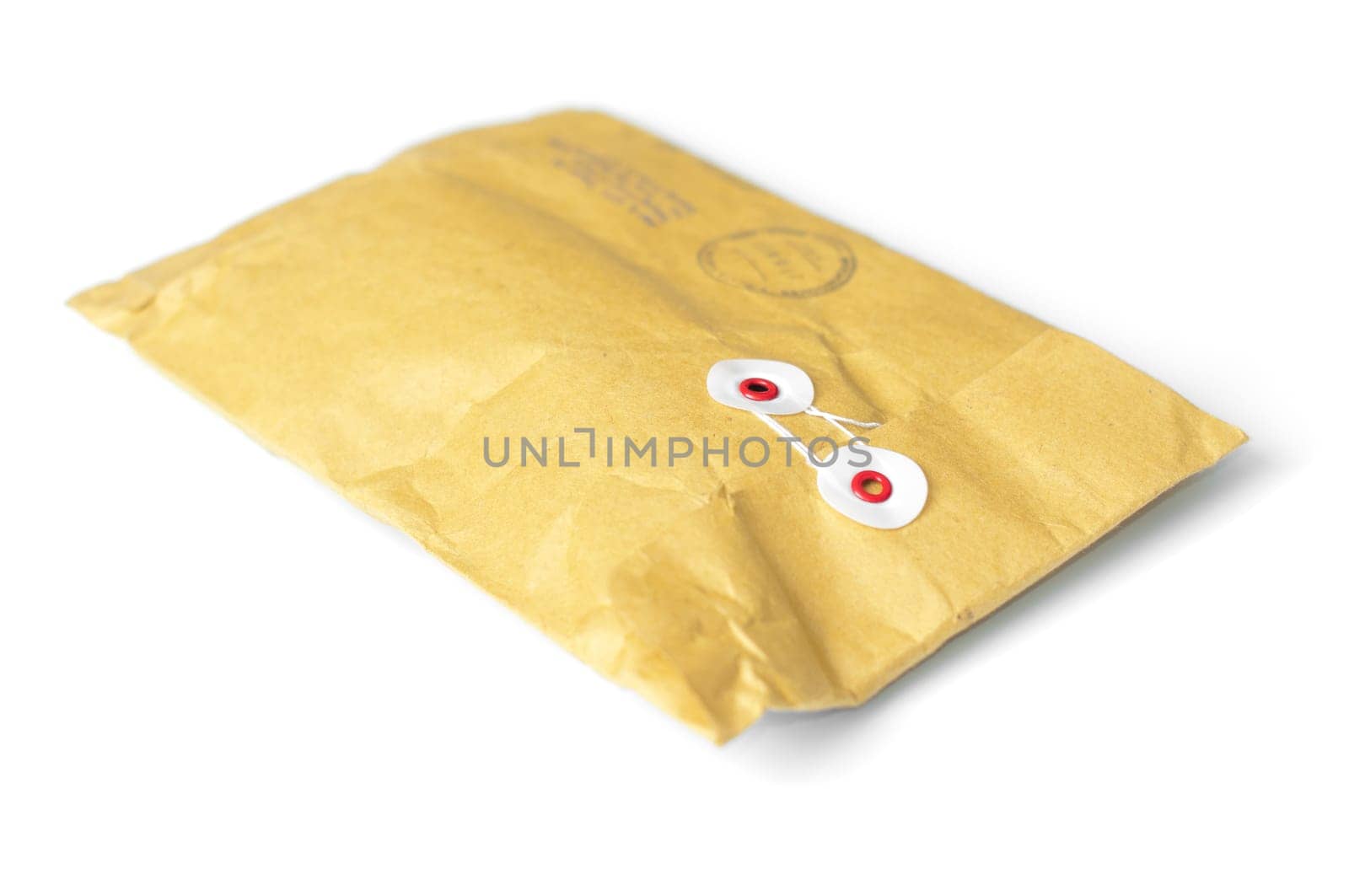 closed yellow mail parcel isolated on white background