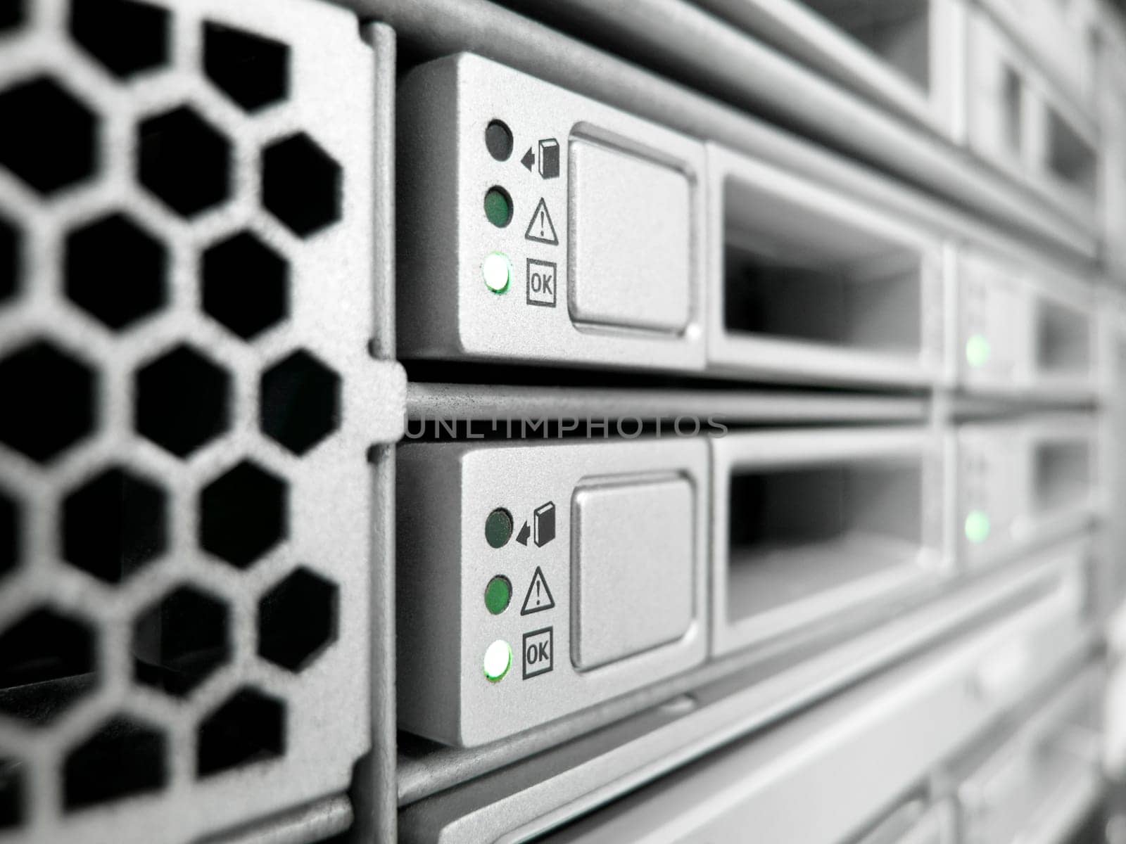 rack of modern corporate servers in new datacenter
