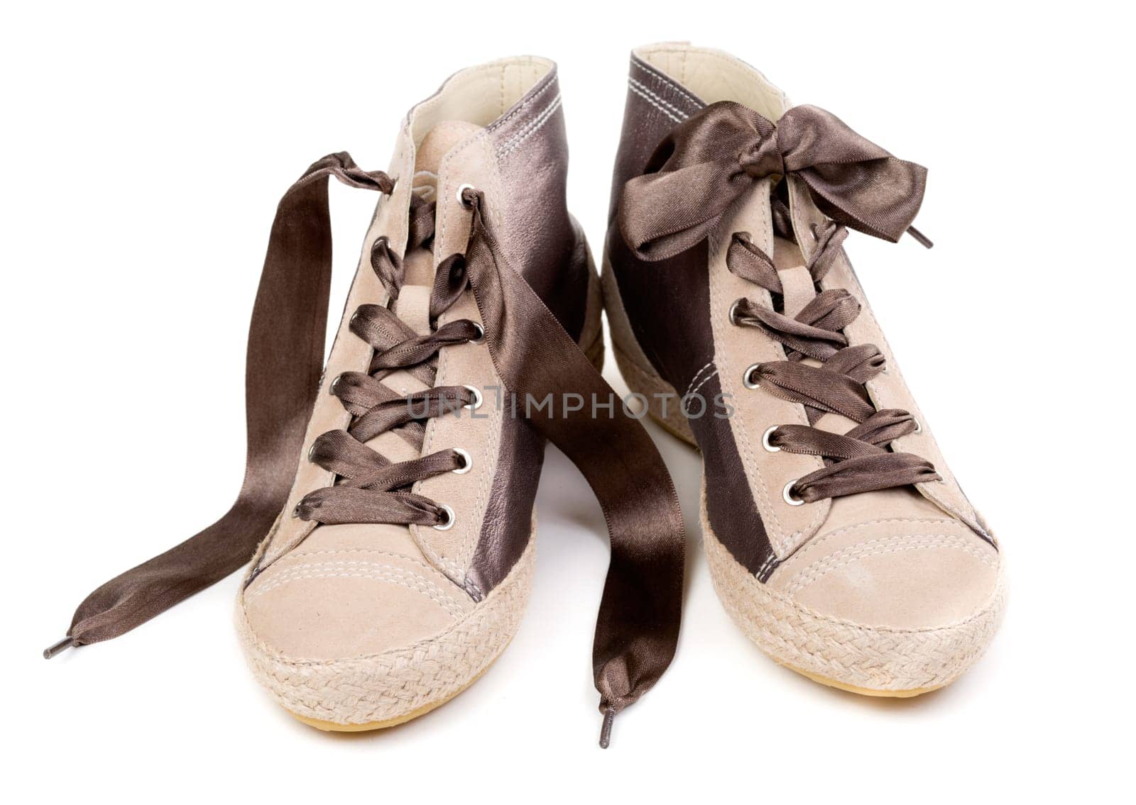 Pair of fashionable sneakers, isolated on white background