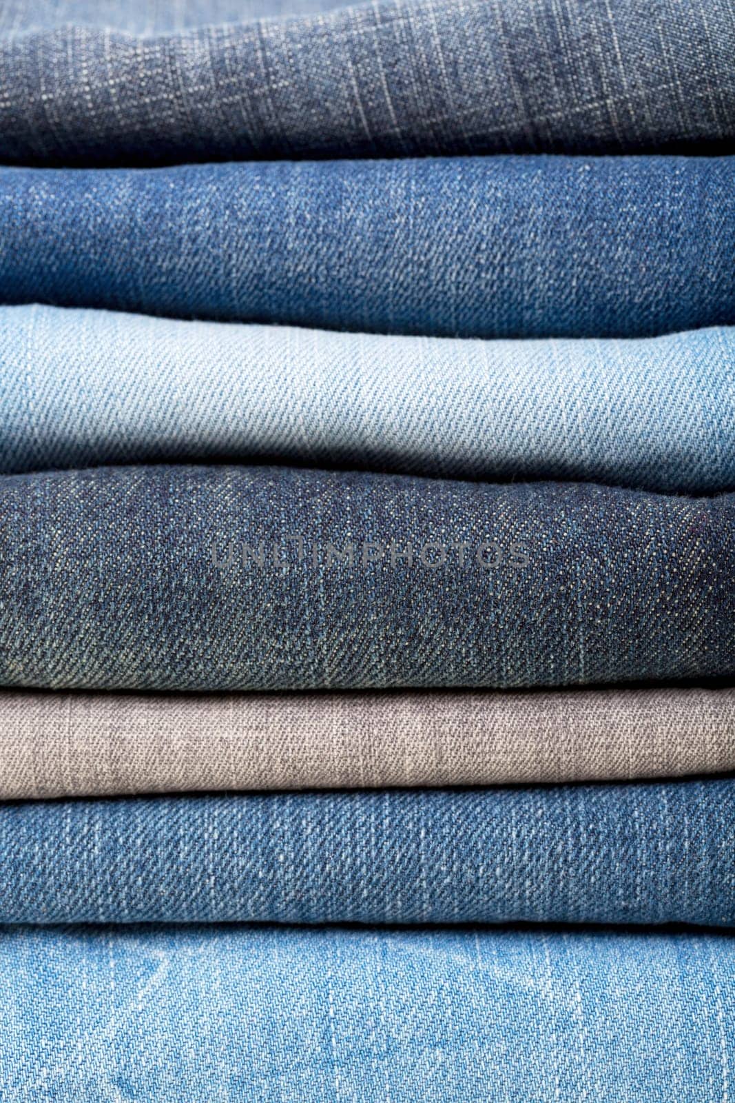 stack of blue jeans background colors