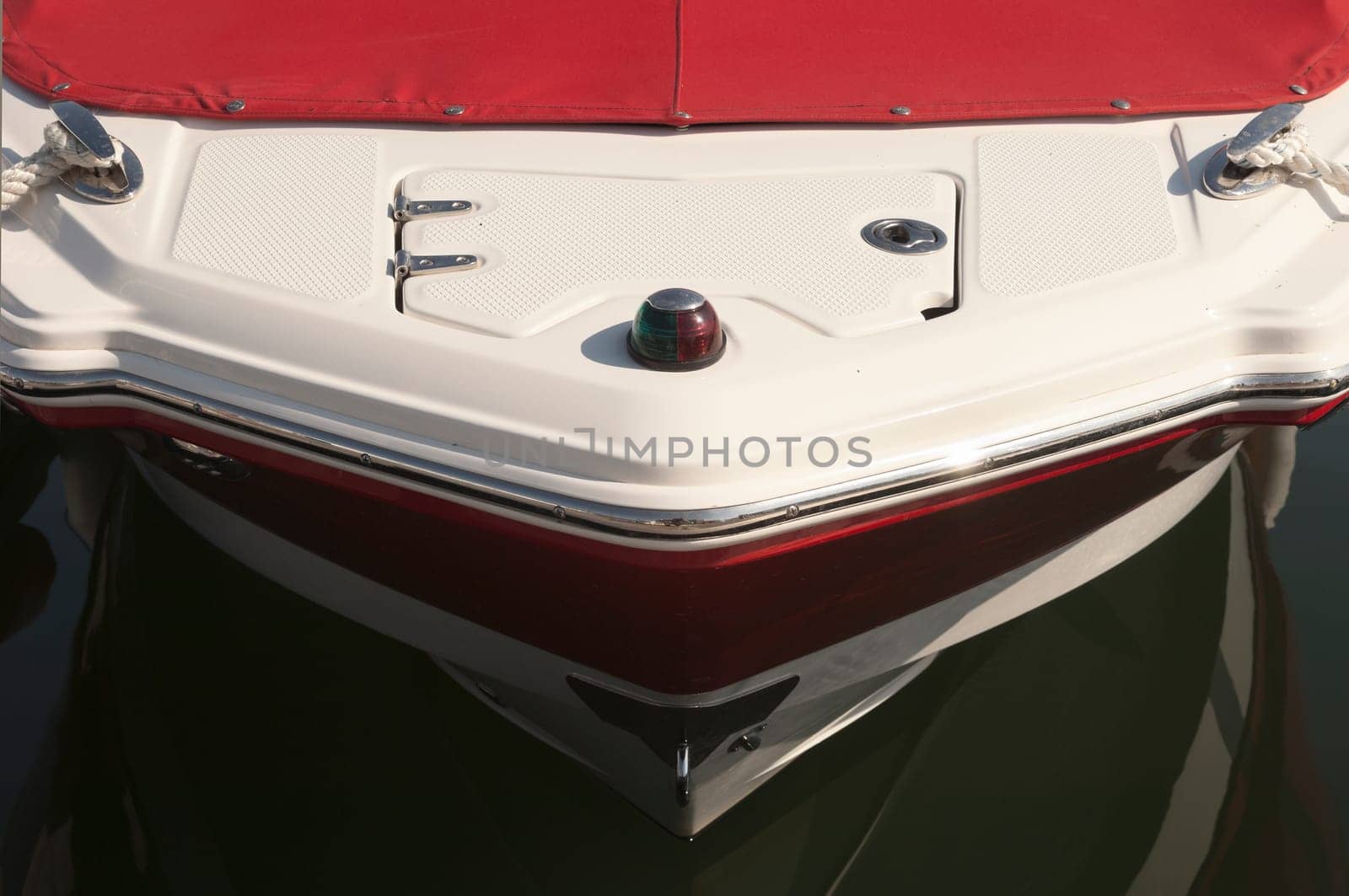 Detail of a red and white boat prow
