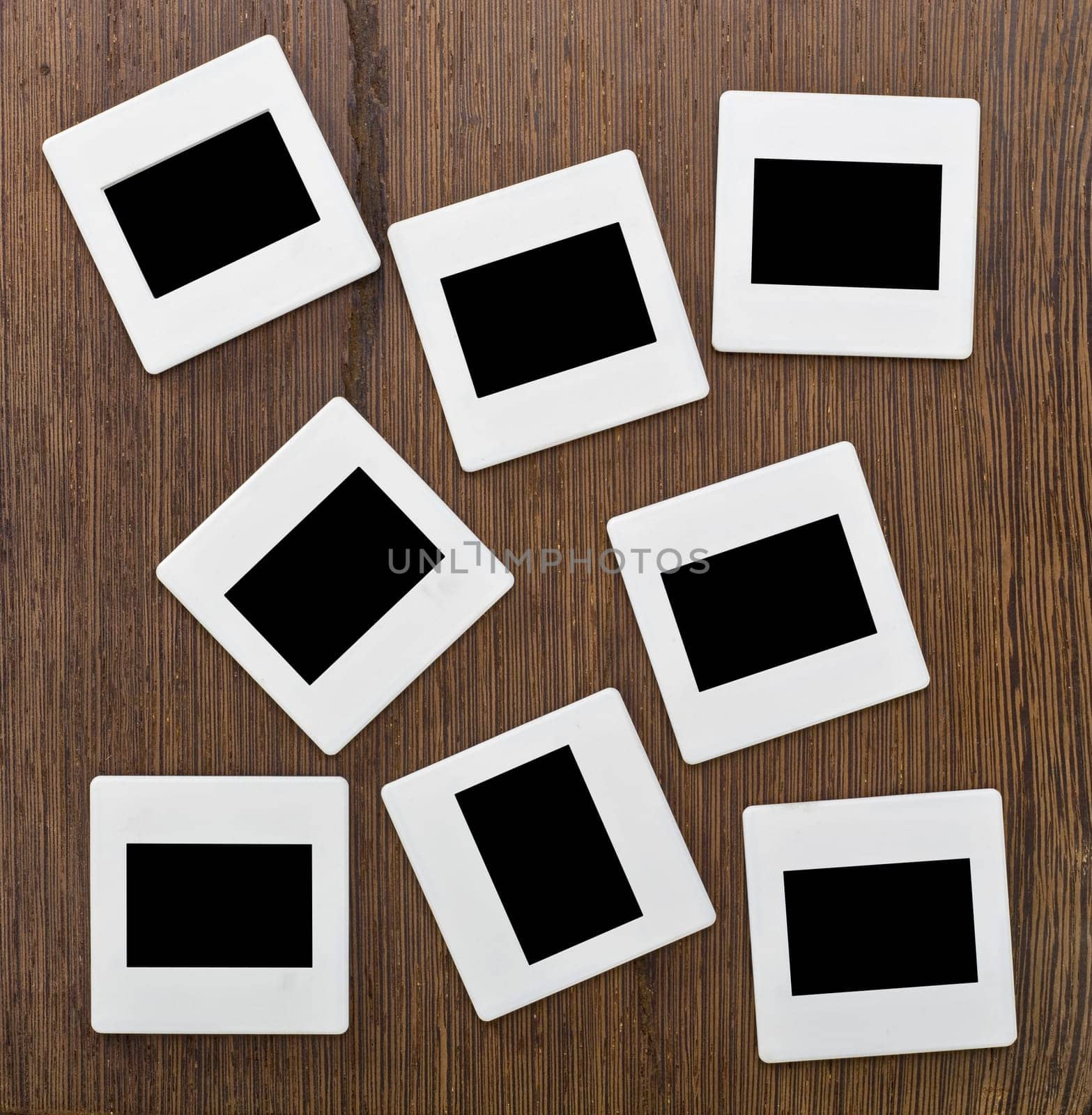 Slides on wooden background
