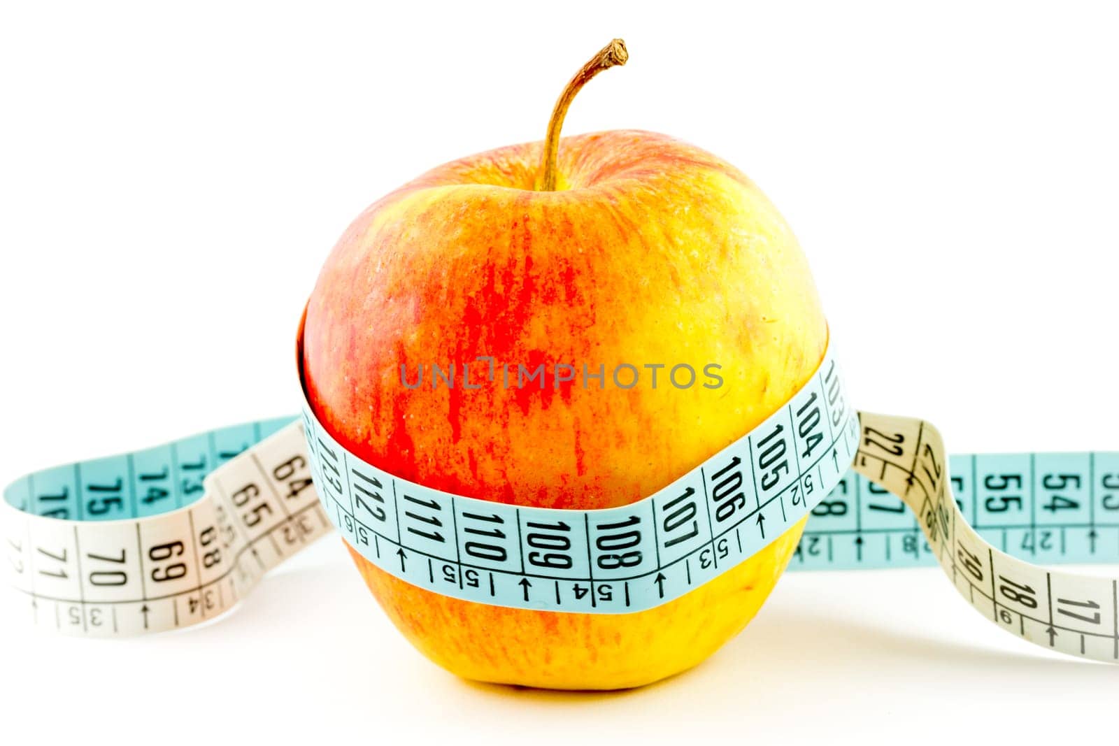 Diet apple food with tape measure