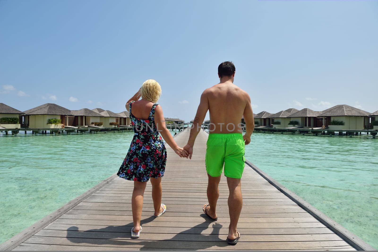 happy young  couple at summer vacation have fun and relax at beautiful sunny  day