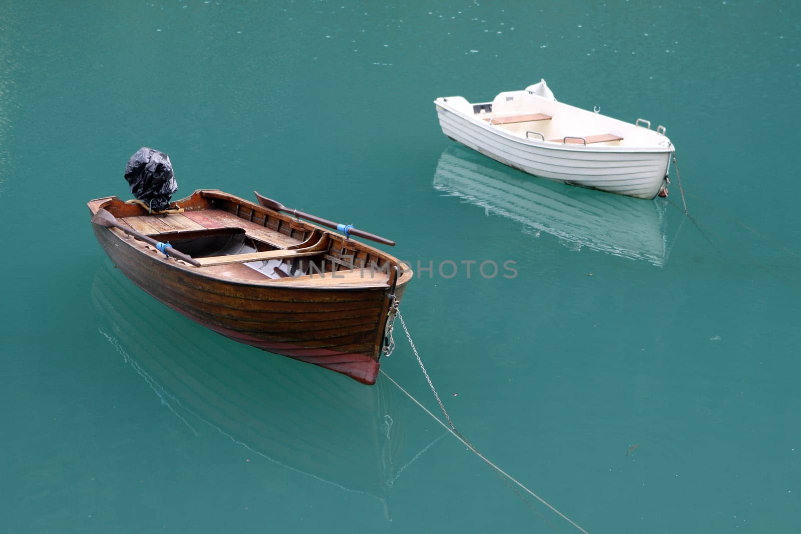 Rowing boats in Lake Molveno. Italy