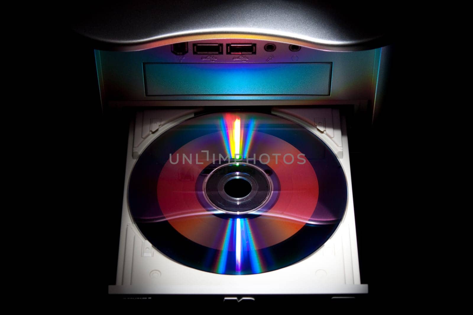 computer disk drive loaded with disk and isolated on white