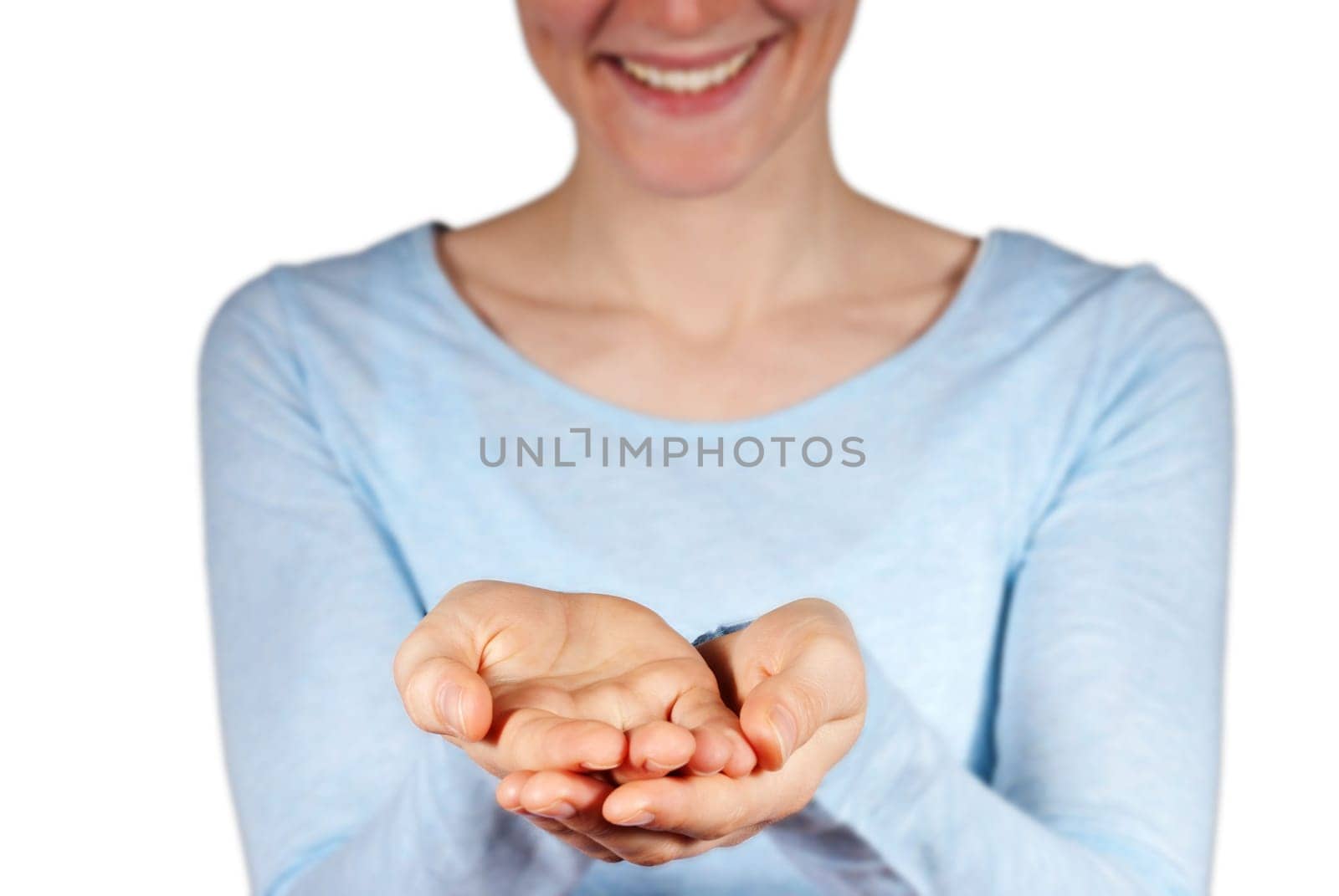 a woman holding up her hands with free space on them, isolated