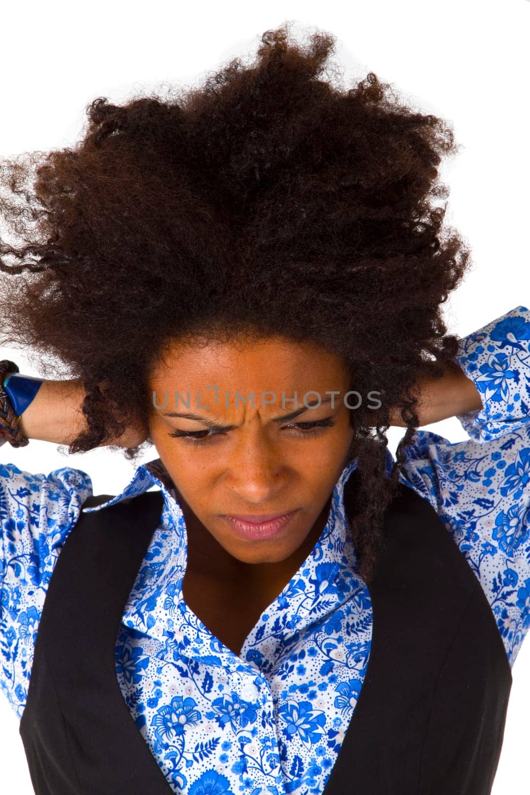 Young African American woman holding hands to her temples - isolated on white background