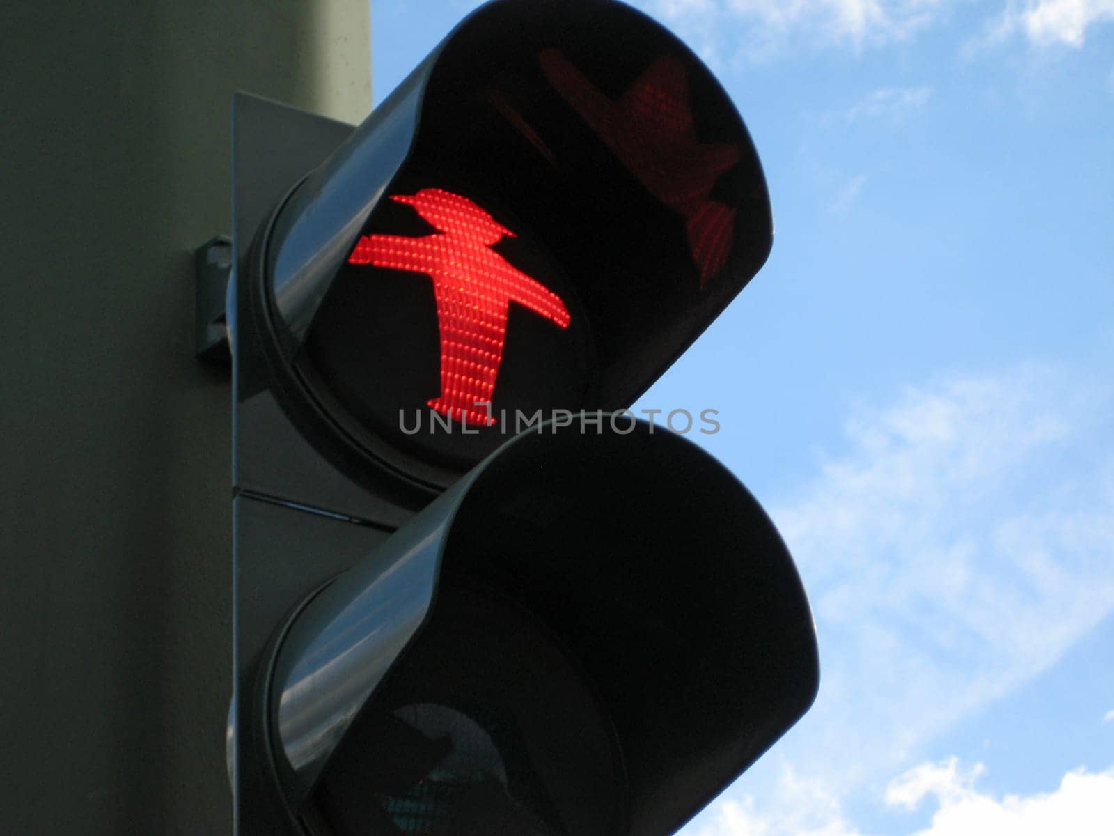 traffic light showing red, stop walking