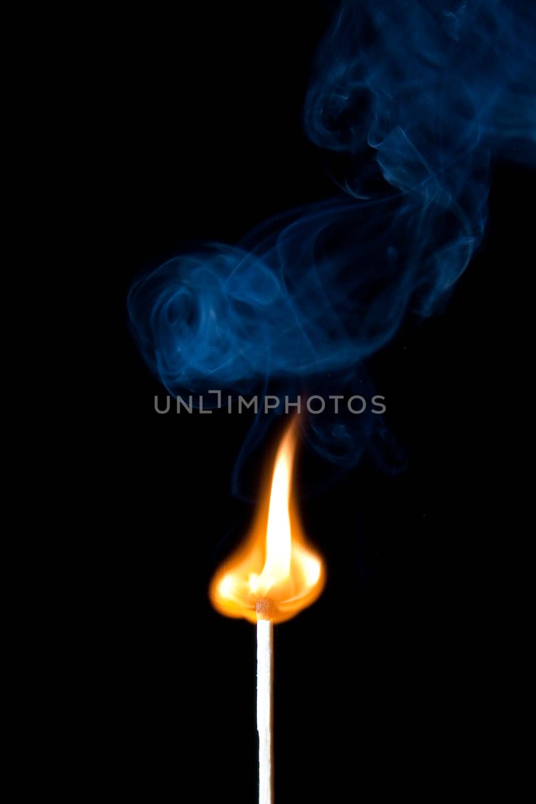 match burning with fire and smoke isolated on black background