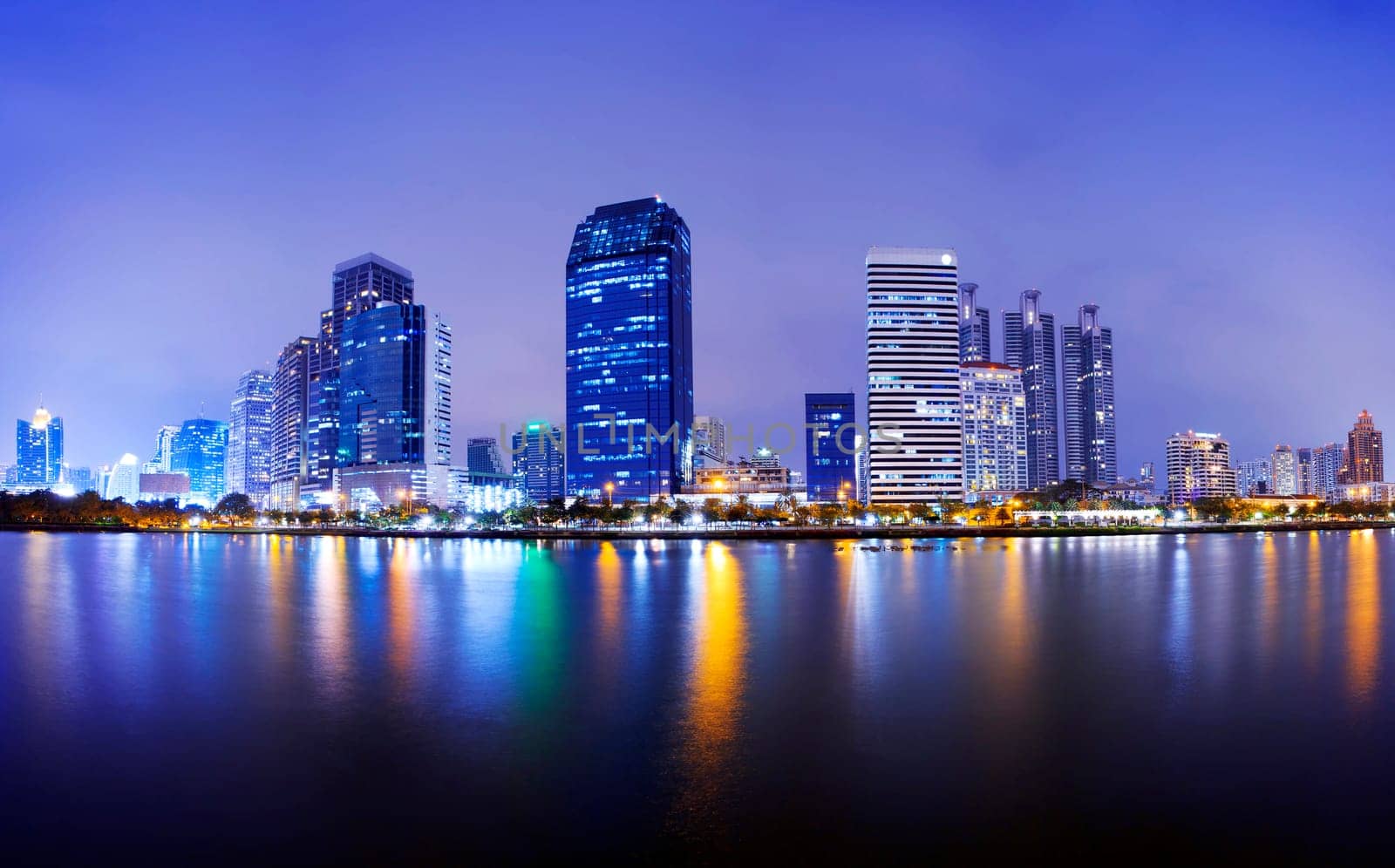 Bangkok city downtown at night with reflection of skyline, Bangkok,Thailand