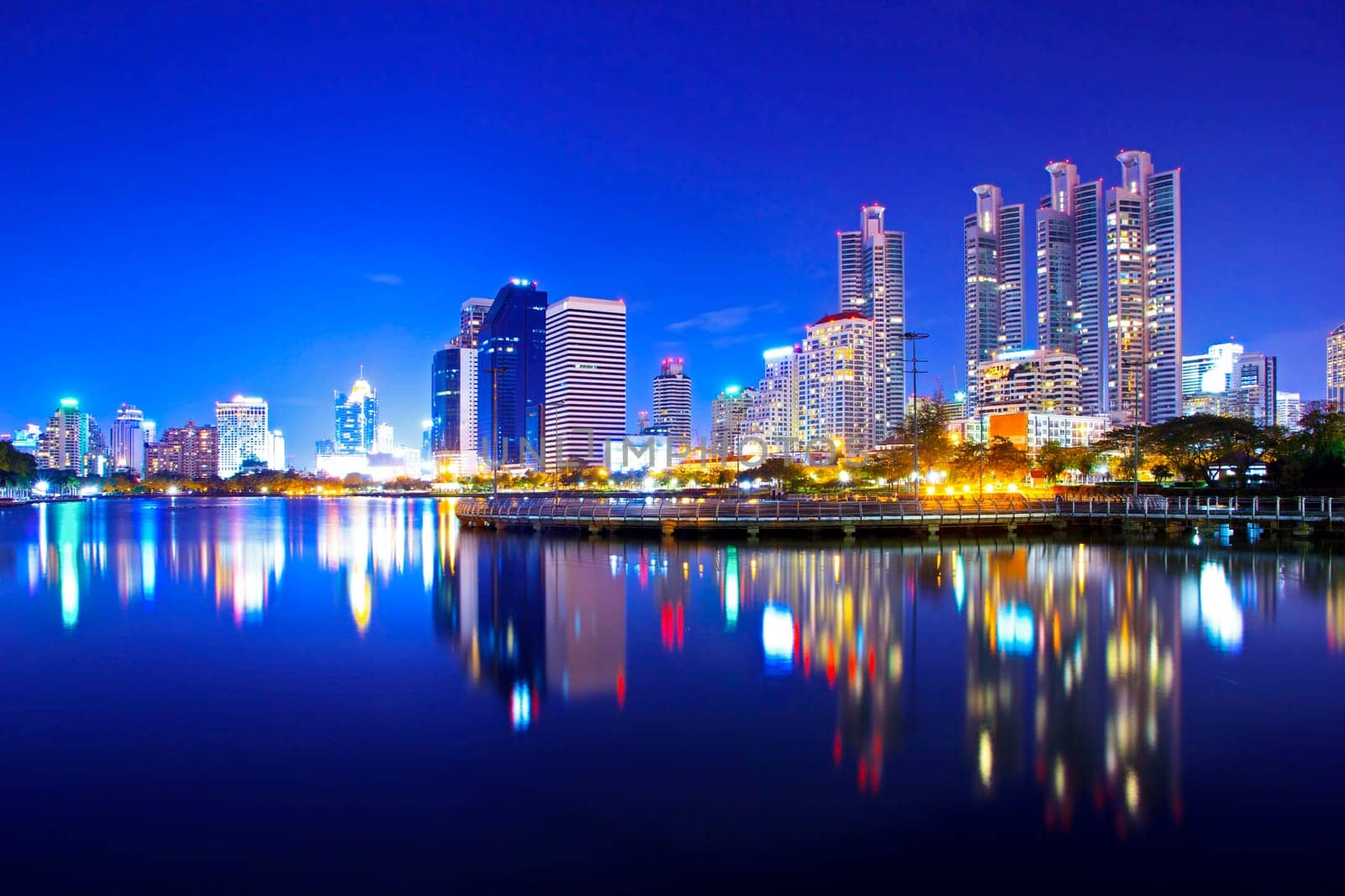 Bangkok city downtown at night with reflection of skyline, Bangkok,Thailand