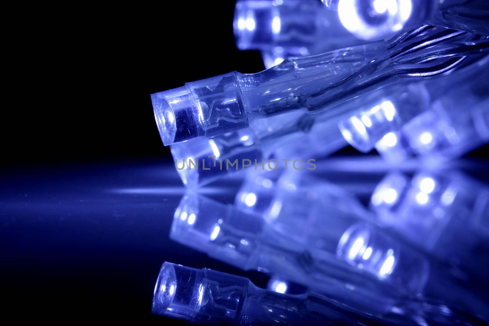 Blue LED lights closeup with reflection