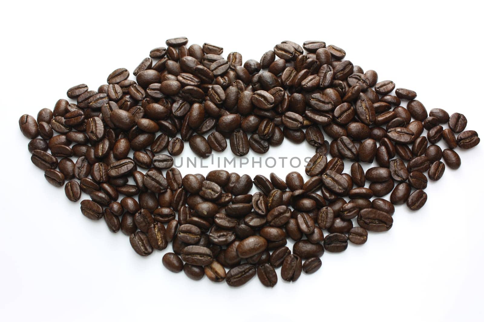 Lips made of coffee beans on a white background