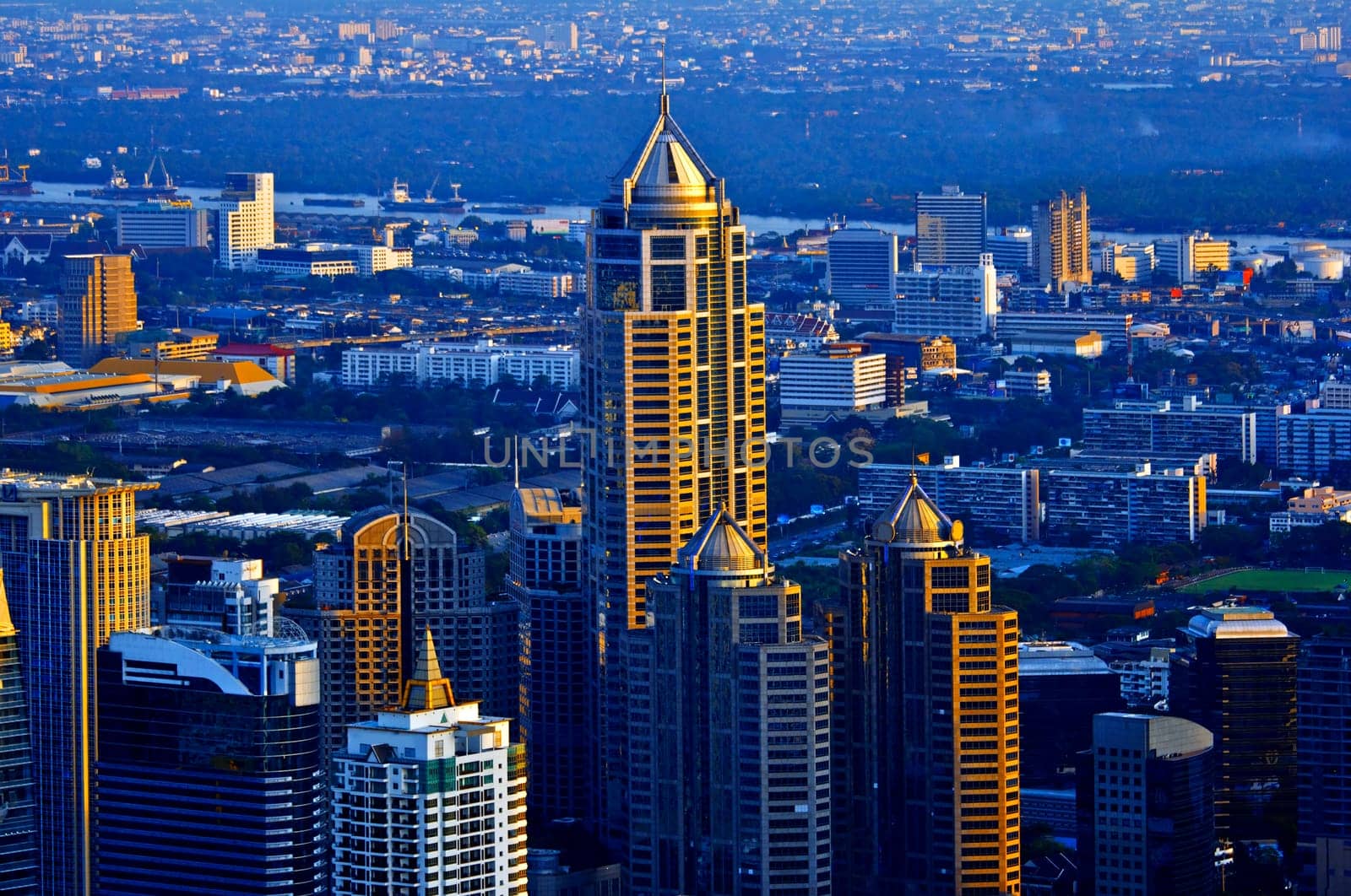 Modern skyscraper city streets in the evening,Bangkok,Thailand