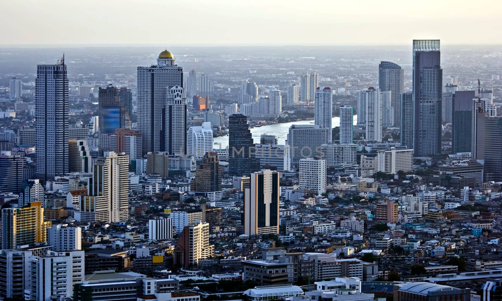 Modern skyscraper city streets in the evening,Bangkok,Thailand