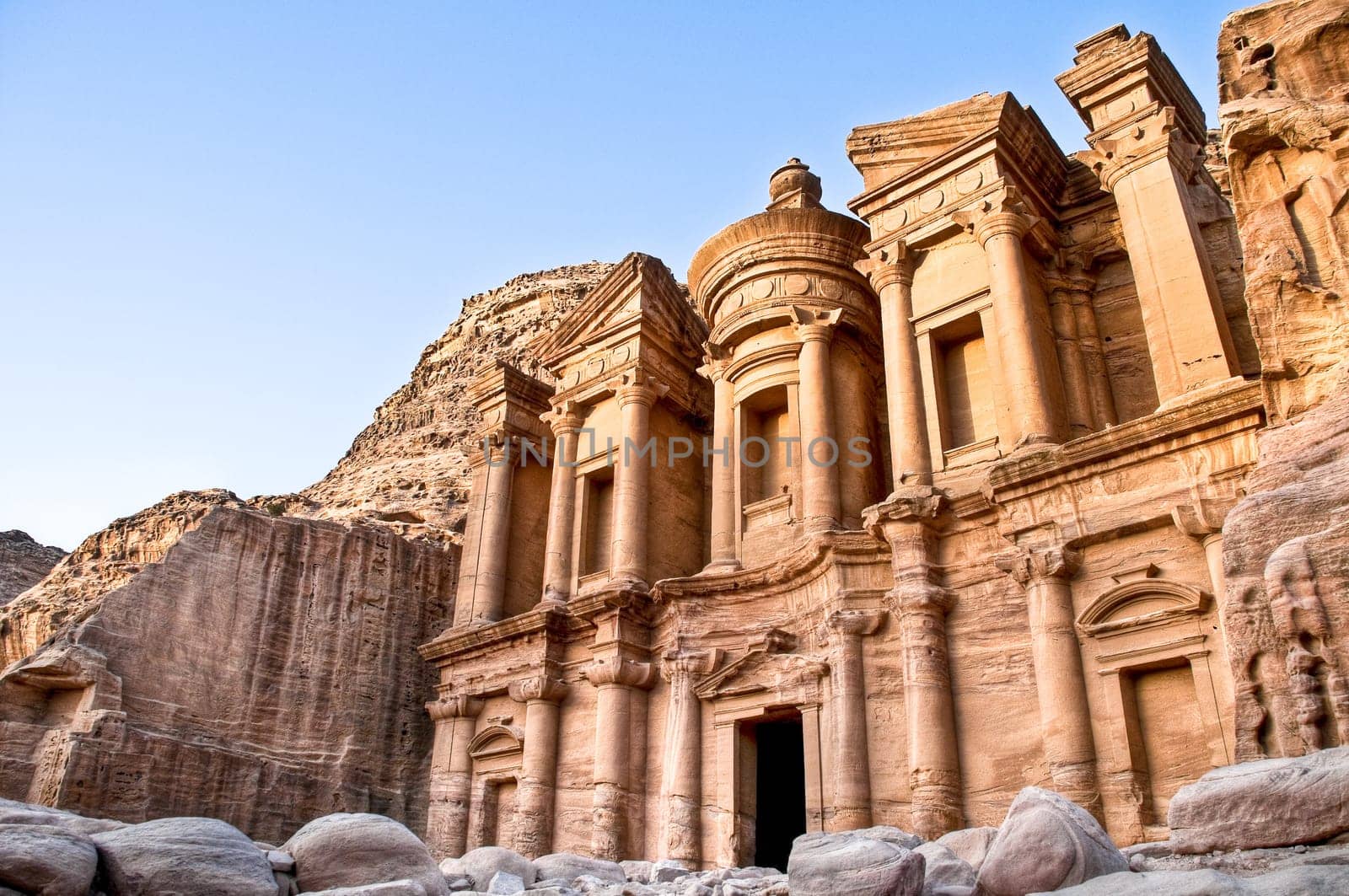 Monastery with blue sky in background high in Petra mountains