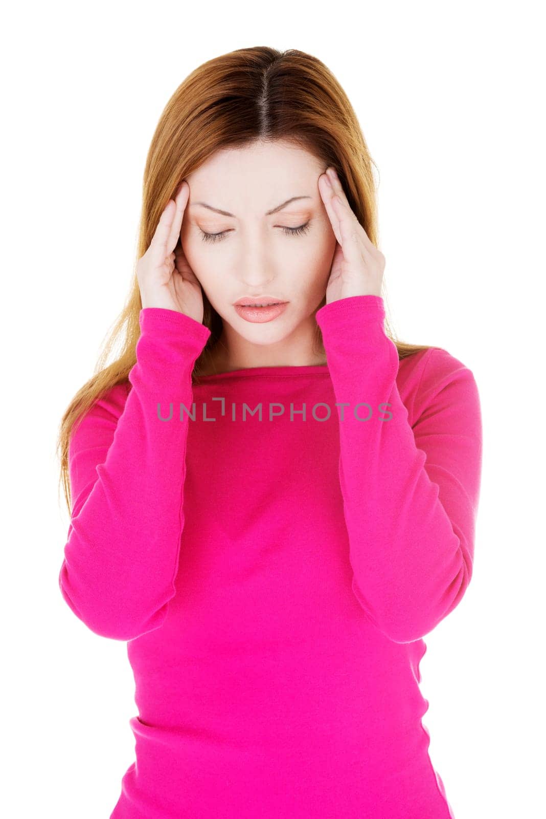 Woman with headache or problem holding her hand to the head