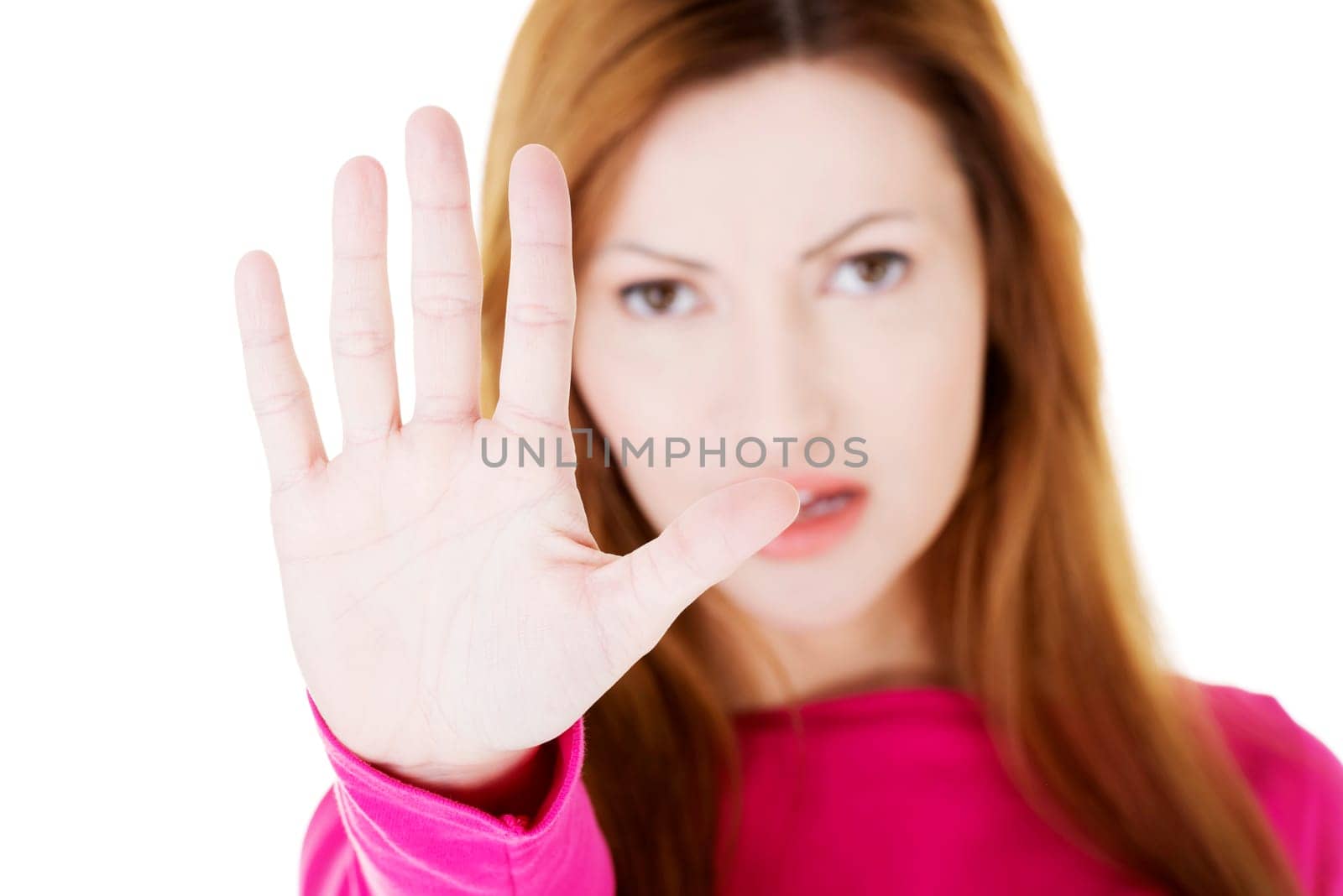 Hold on, Stop gesture showed by adult woman hand