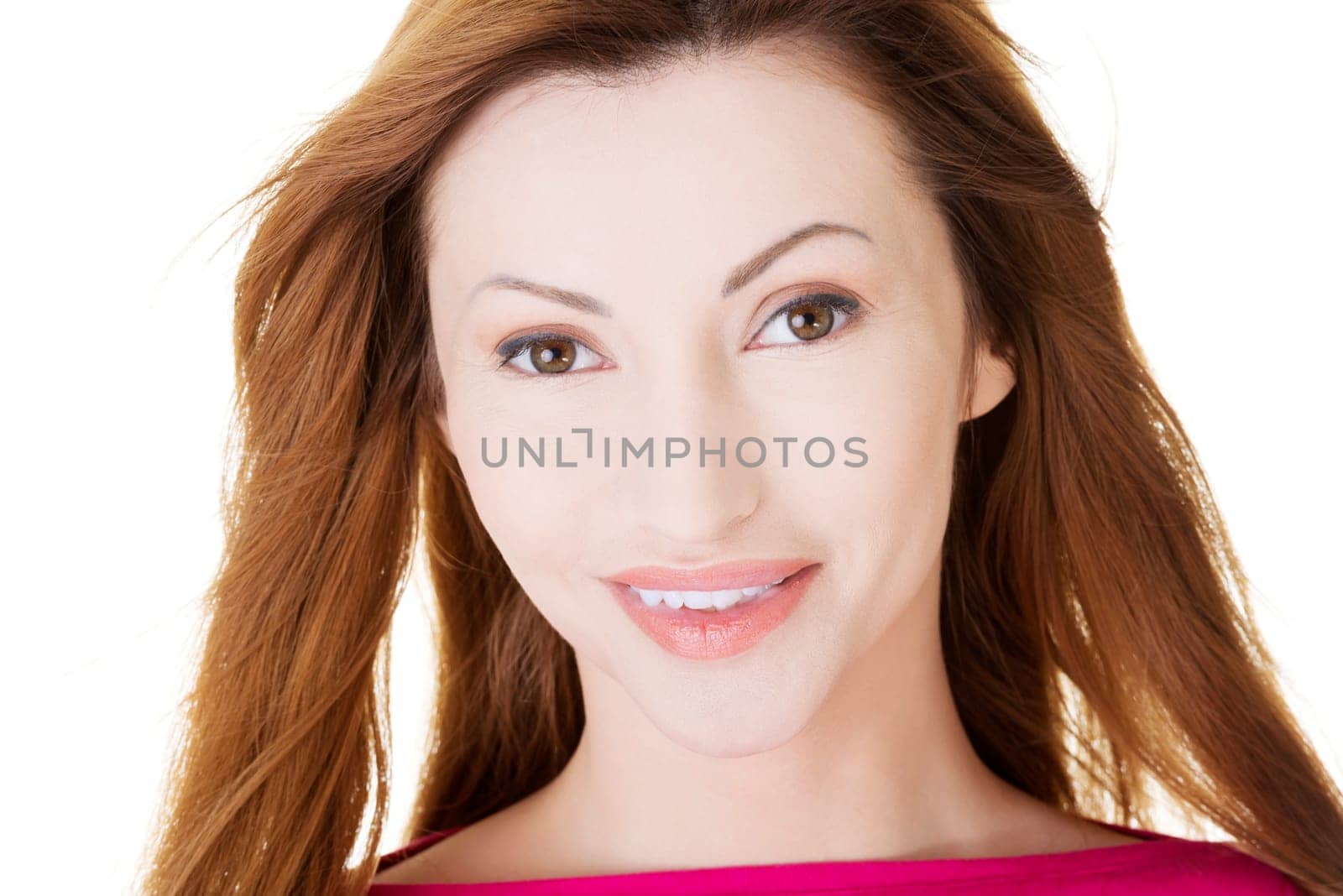 Portrait of happy middle aged woman over white background