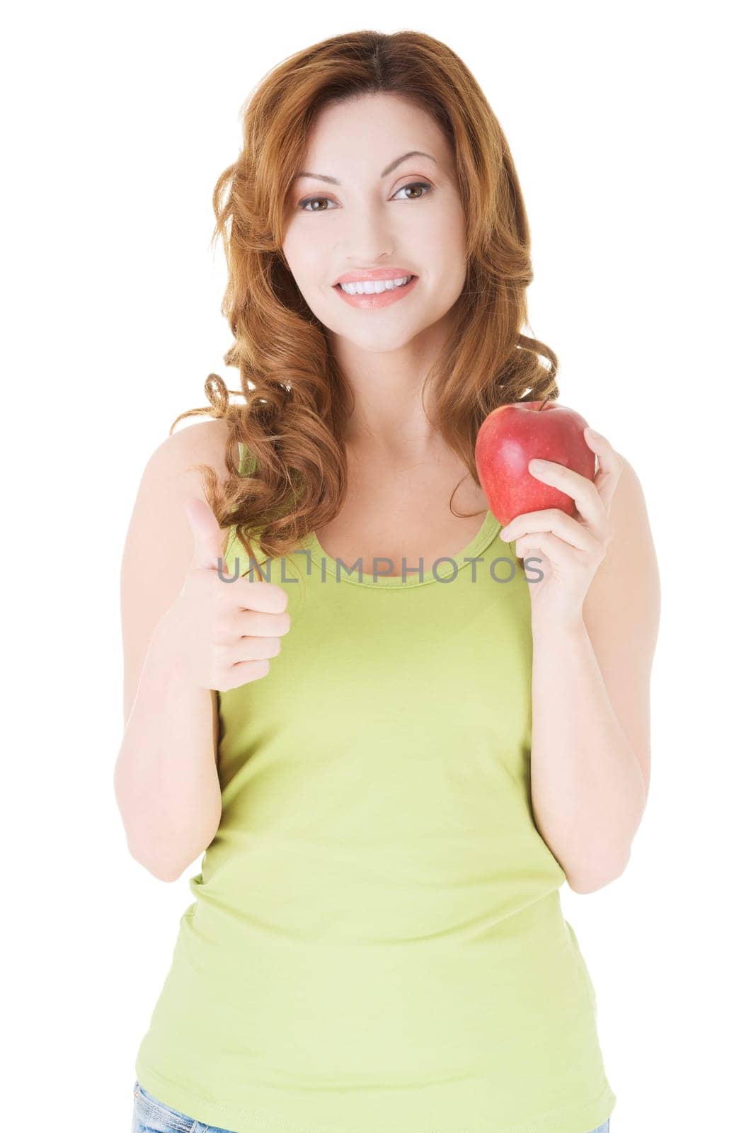 Beautiful woman with red fresh apple.