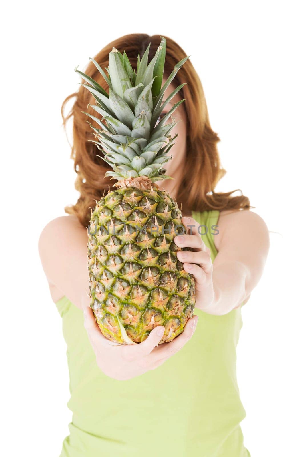 Happy woman with fresh pineapple fruit, isolated on white