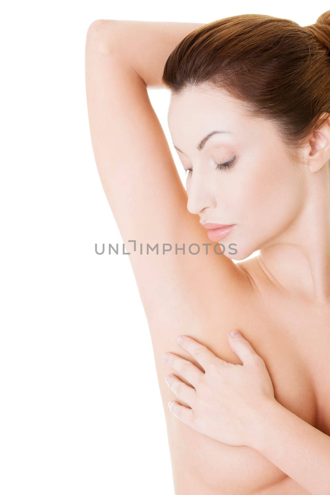 Beautiful fit topless woman, isolated on white