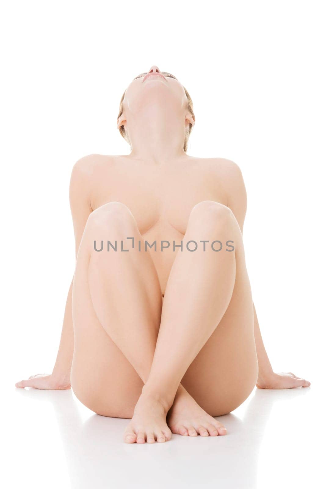 Sexy fit naked woman with healthy clean skin, isolated on white background