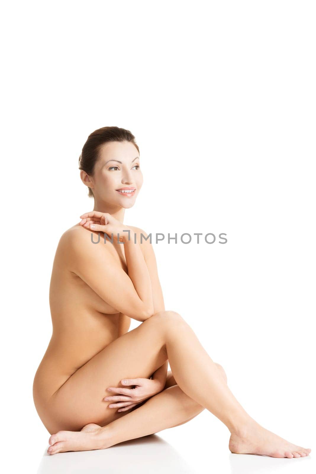 Sexy fit naked woman with healthy clean skin, isolated on white background