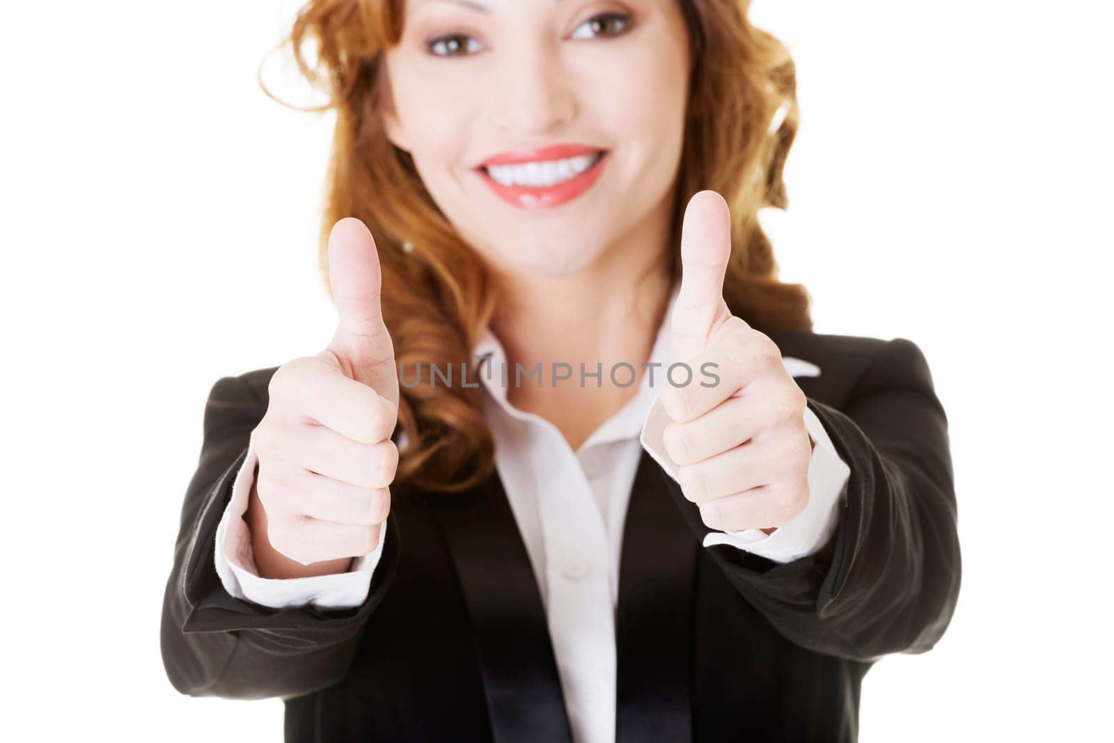 Happy smiling business woman with thumbs up, ok gesture