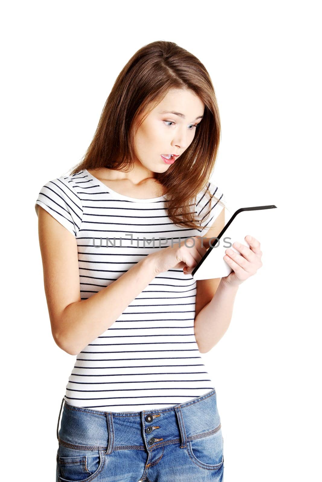 Beautiful young woman using tablet computer , isolated on white
