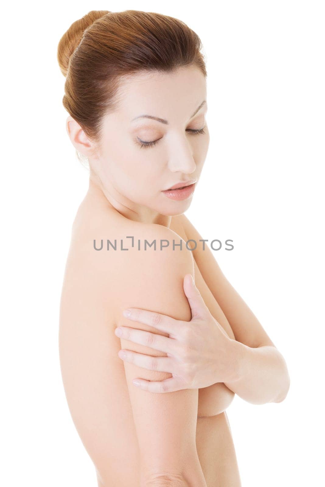 Beautiful fit topless woman, isolated on white