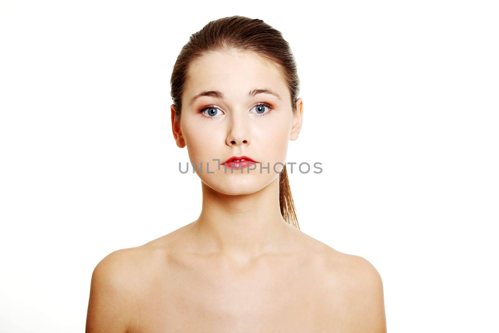 Beautiful teen woman's face with fresh clean skin - isolated on white background