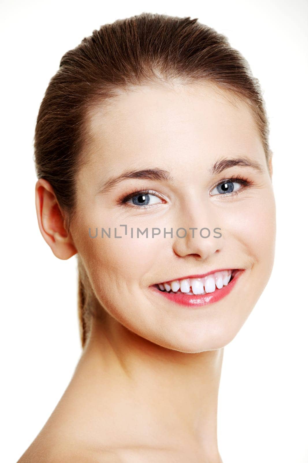 Beautiful teen woman's face with fresh clean skin - isolated on white background
