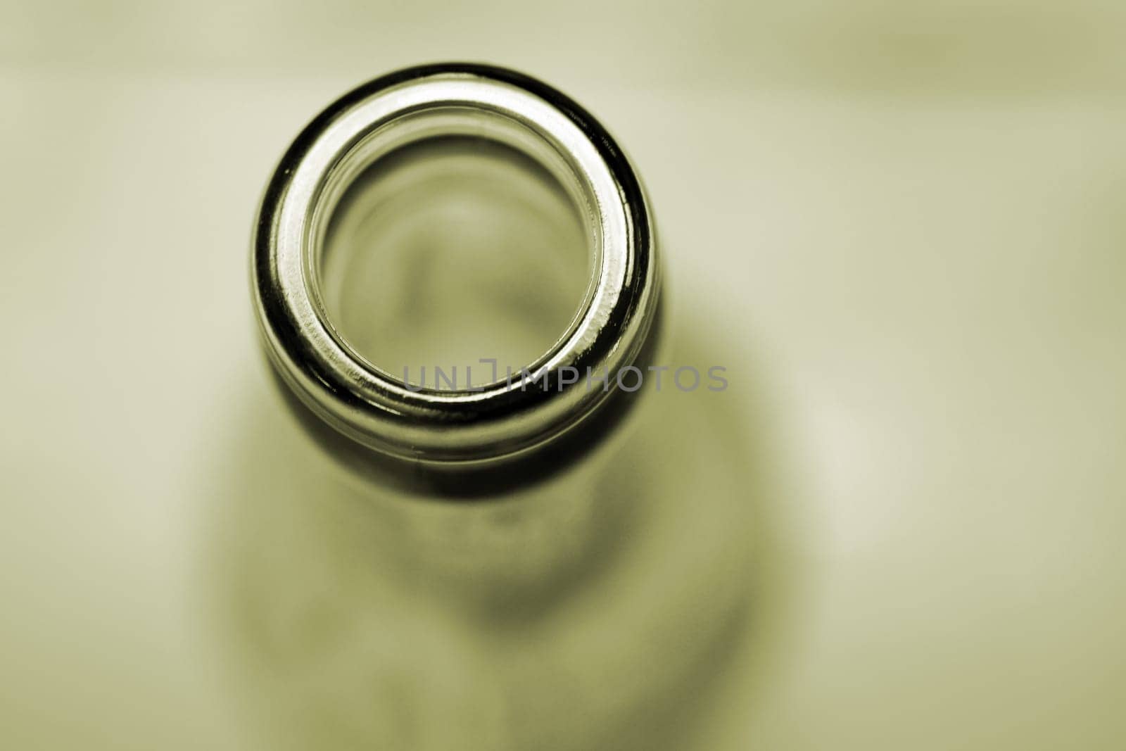 The close-up of a bottle opening.