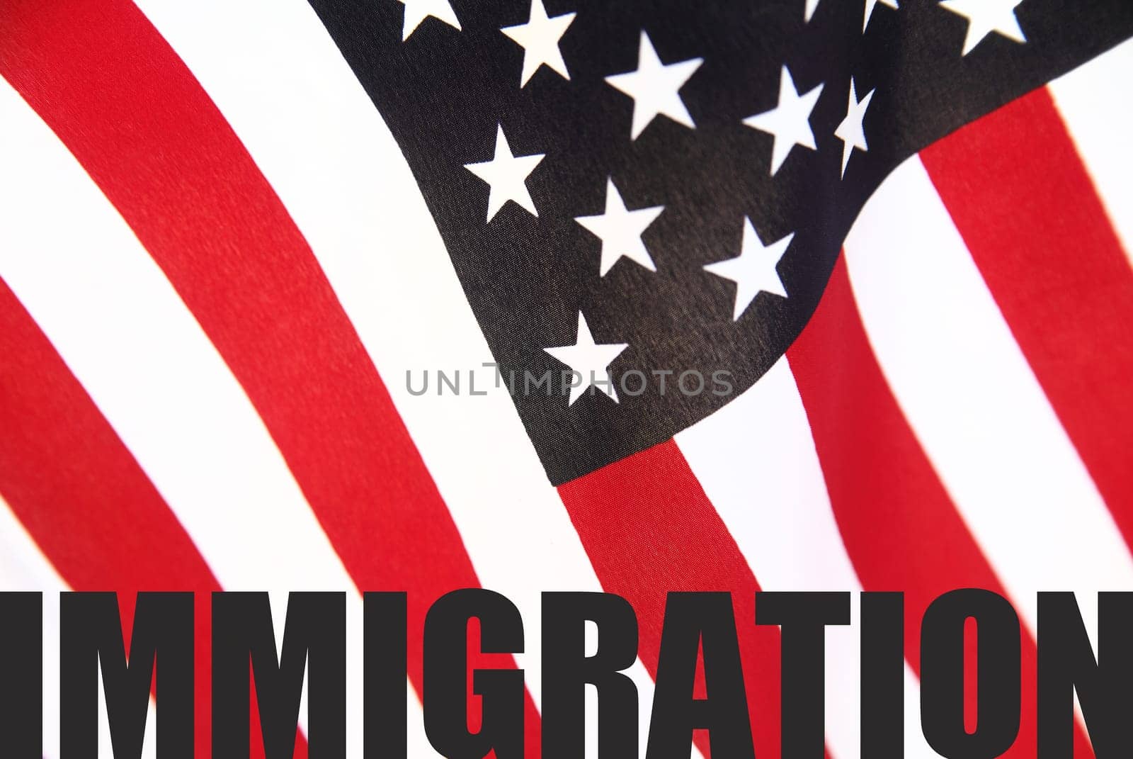 the word 'immigration' on a U.S. flag