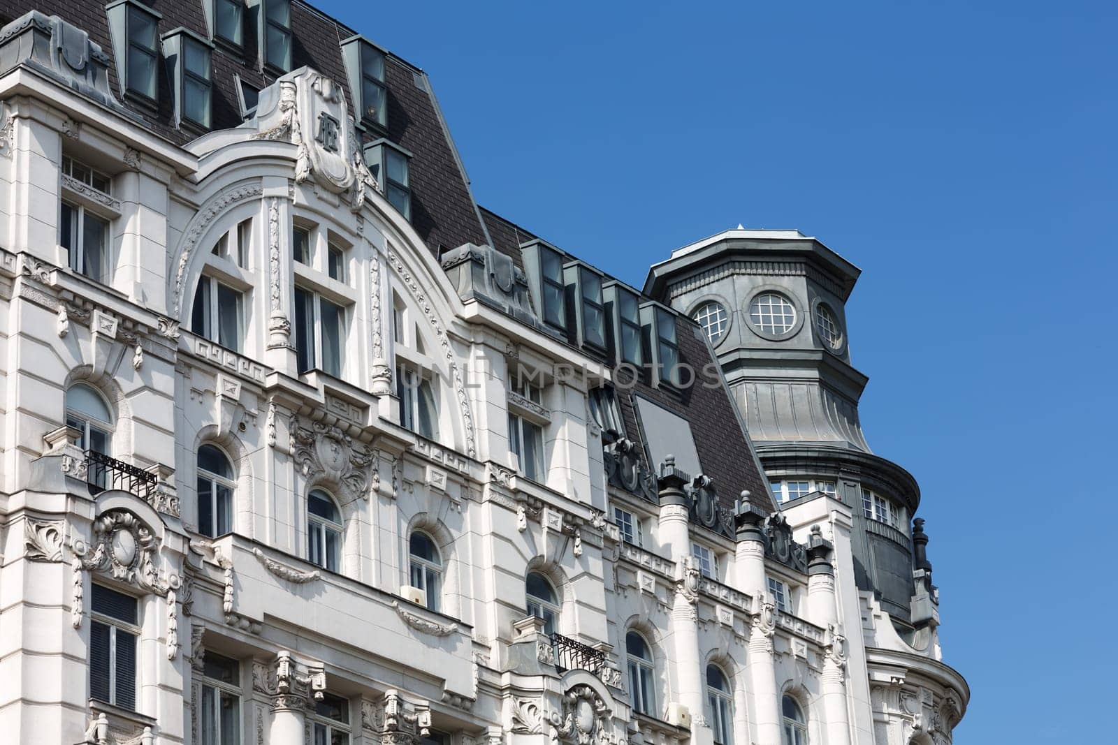 Old building architecture,city apartment with attic conversion
