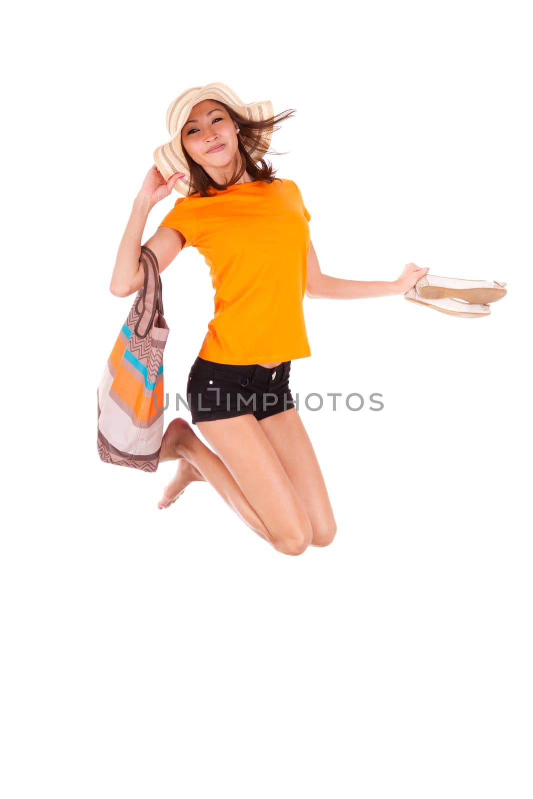 Young beautiful asian woman jumping of joy, isolated on white background - Asian people