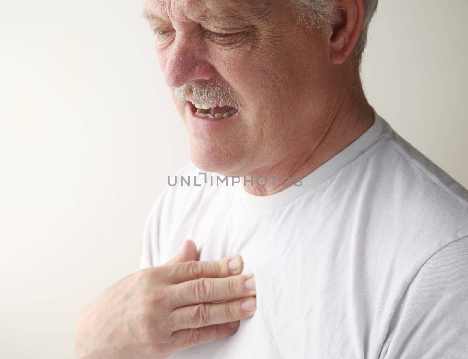 senior feels pressure in his chest