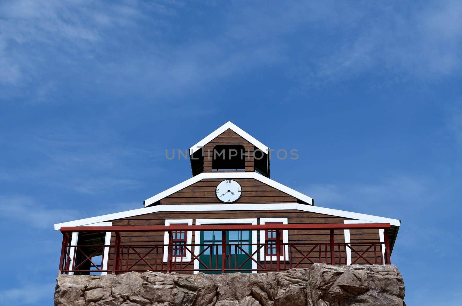 Clock house and blue sky
