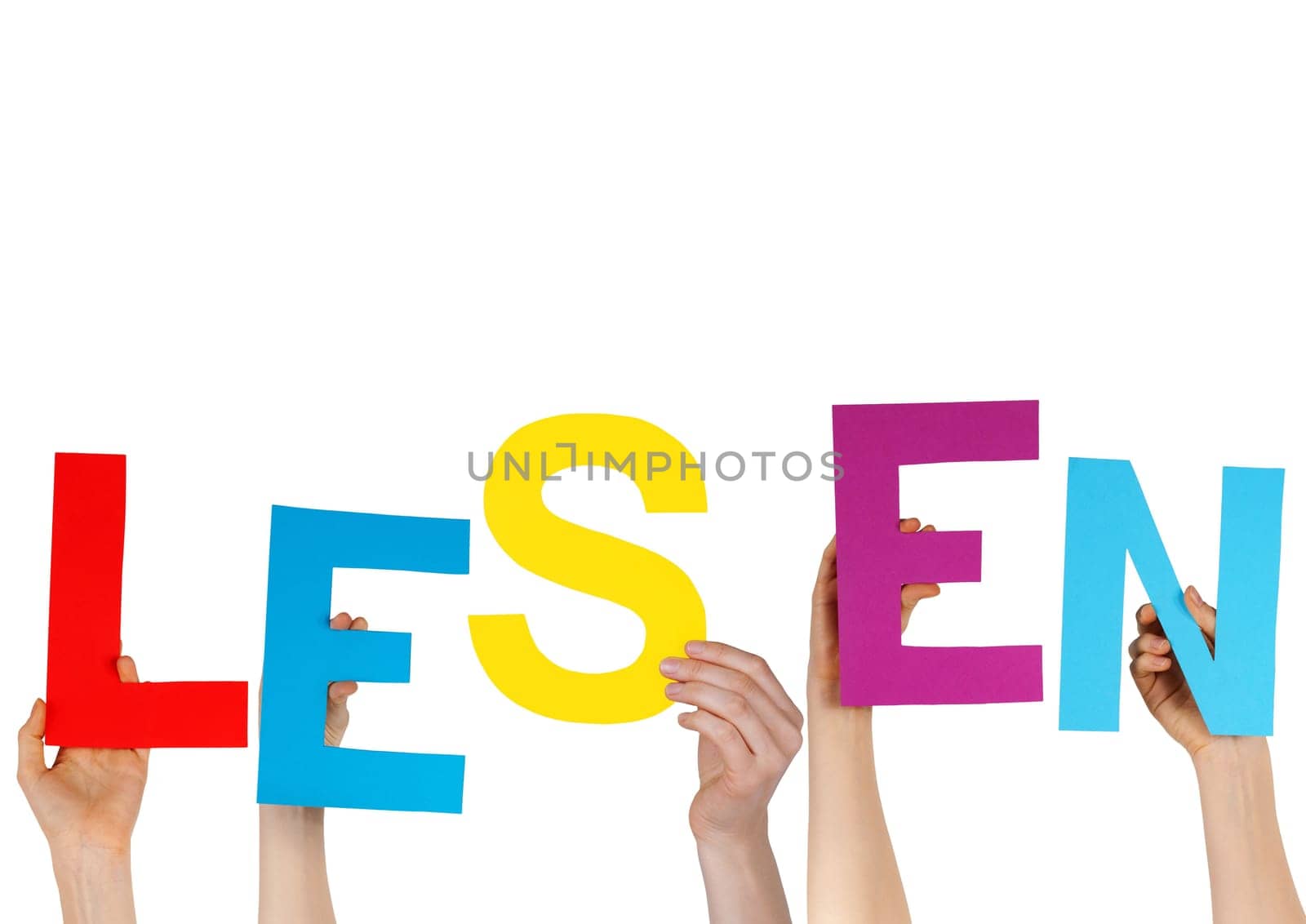 the german word LESEN in charakters hold by hands, isolated