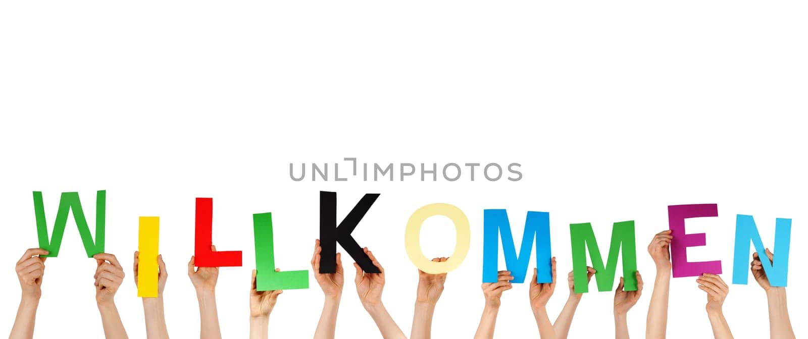 hands holding the german word willkommen, isolated