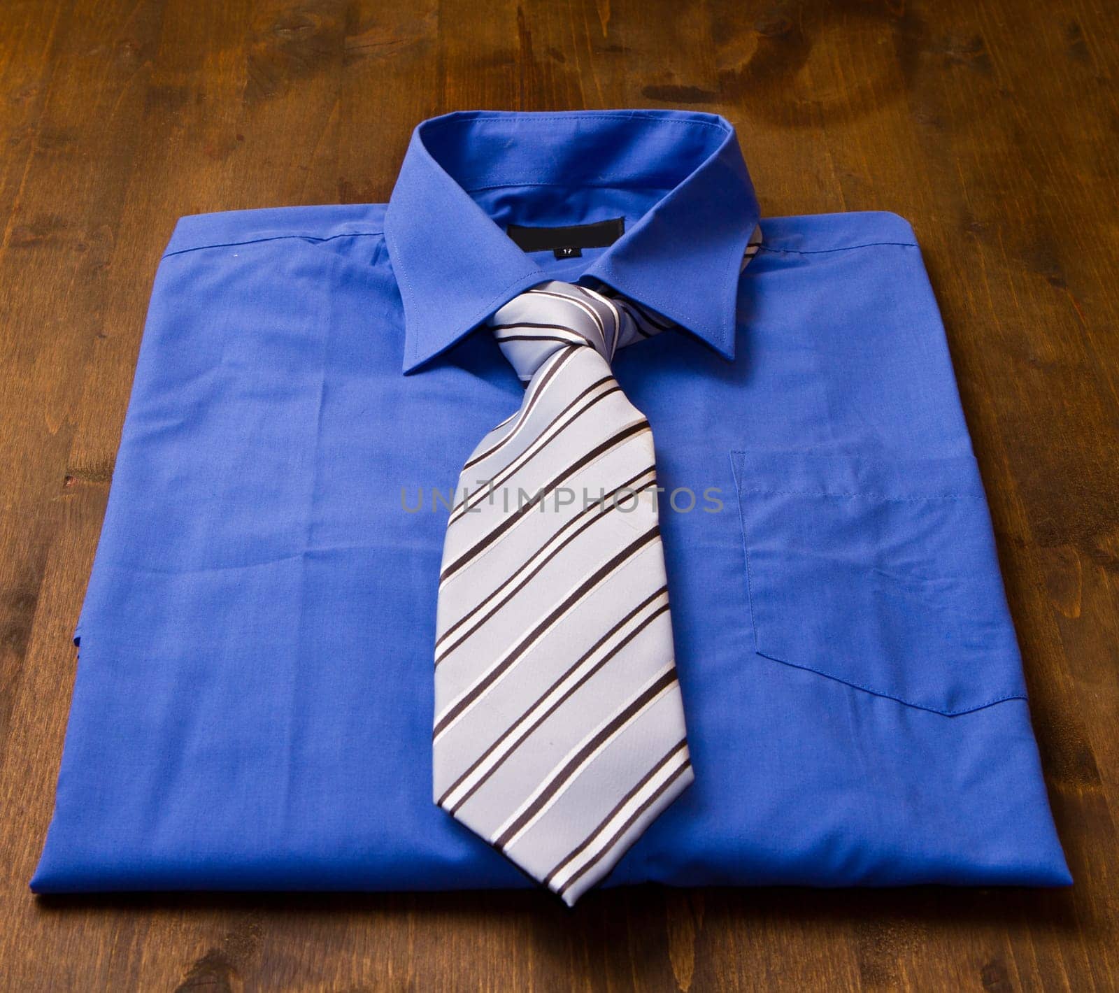 New blue man's shirt and tie