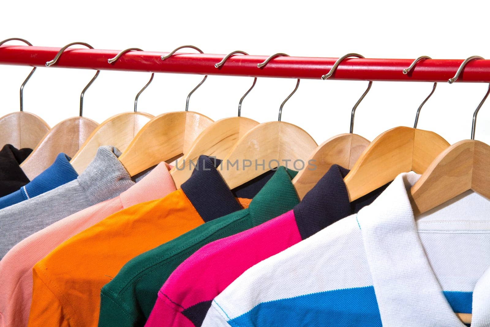 Lots of T-shirts on hangers